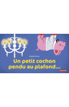 Un petit cochon pendu au plafond